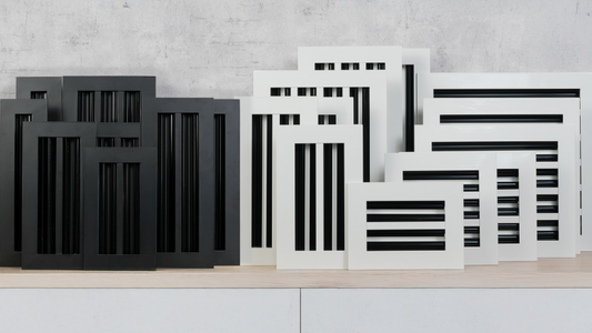 Diverse range of modern black and white GREEN VENT air vents on display
