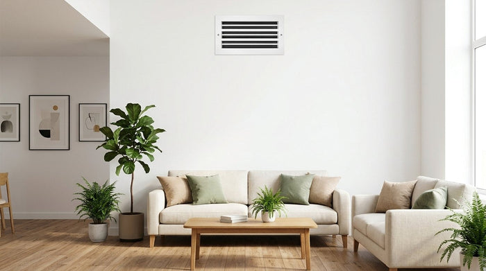 White aluminum linear slot diffuser high on a living room wall