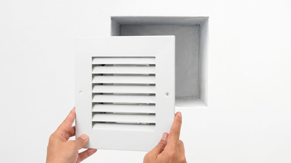 Line the Green Vent grille up over the opening, using the existing screw holes.
