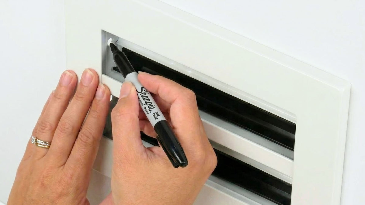 Hold it level and mark the screw holes.