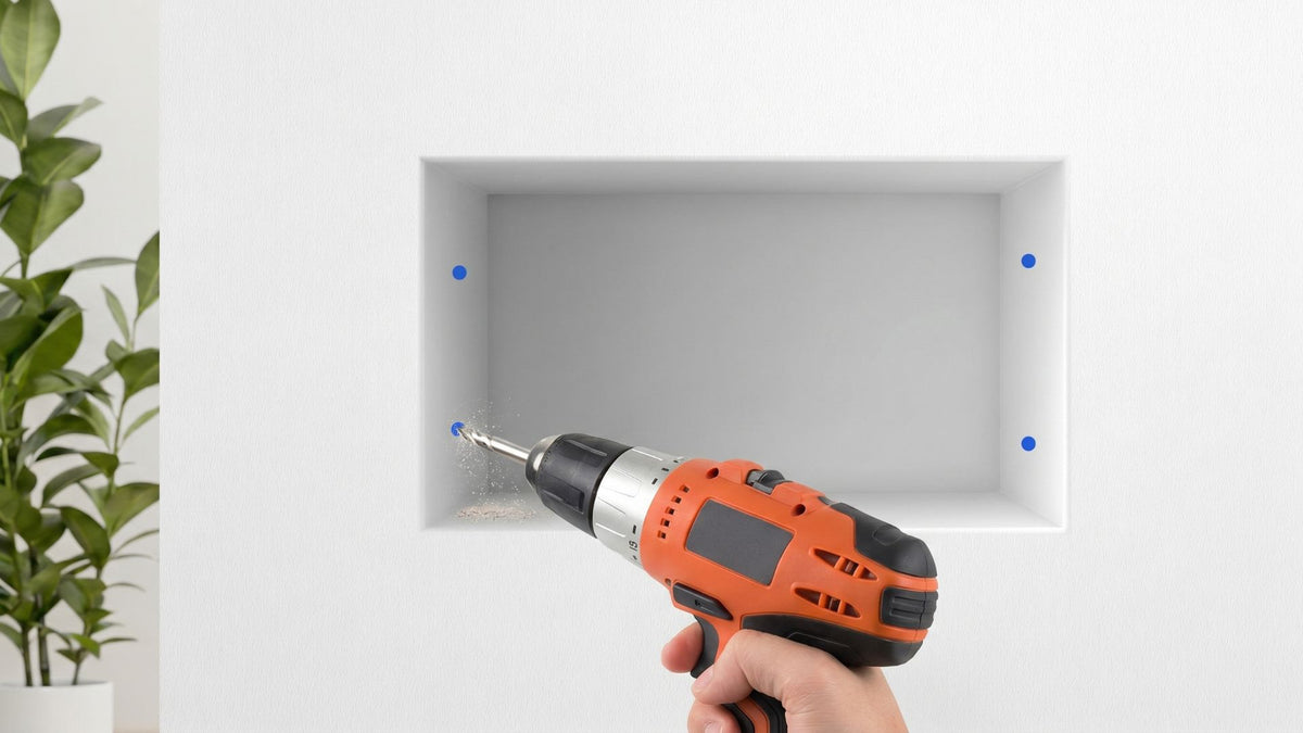 Drill a small pilot hole at each mark.